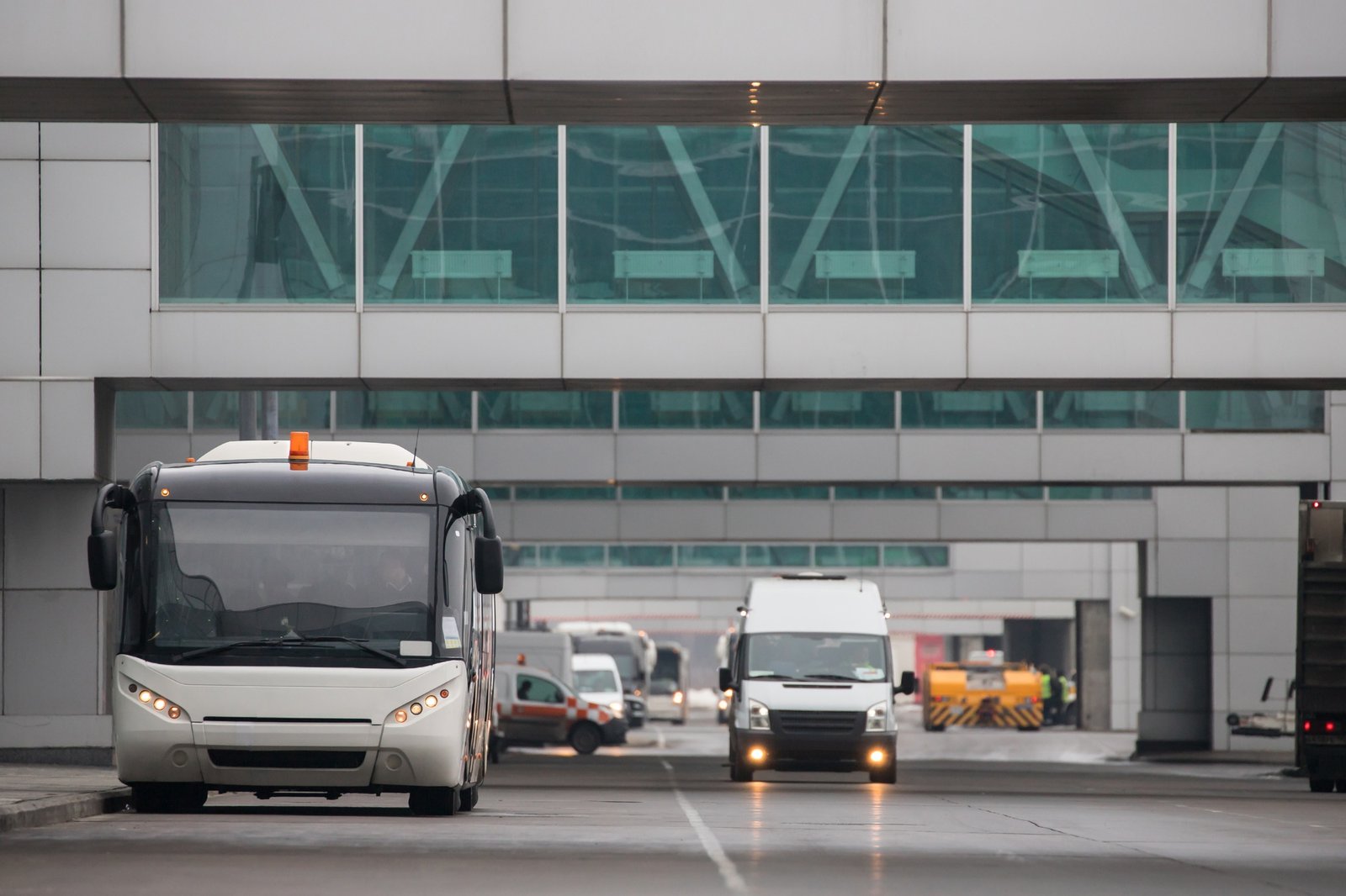 Shuttle bus for transportation of passengers at airport terminal. Aviation services